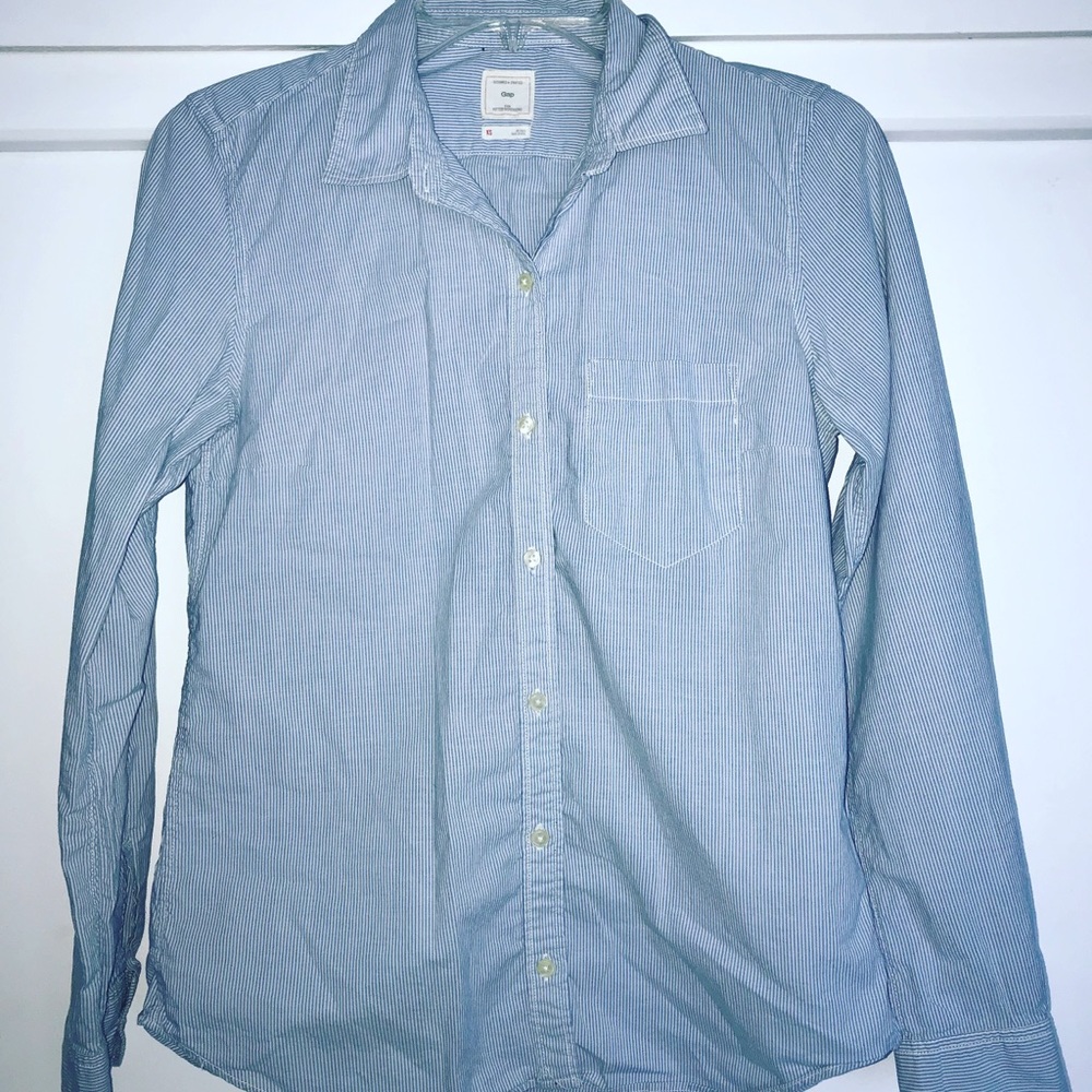 Pinstripe long sleeve button up shirt.